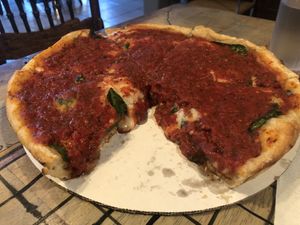 Traditional deep dish with spinach at Kitchen 17 in Chicago