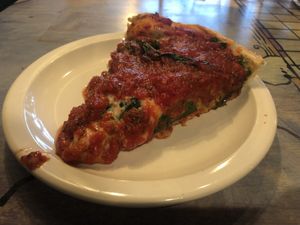 Traditional deep dish with spinach at Kitchen 17 in Chicago