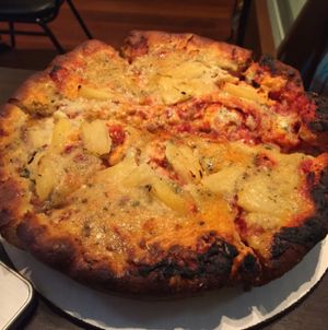 Hawaiian pizza omg at Kitchen 17 in Chicago