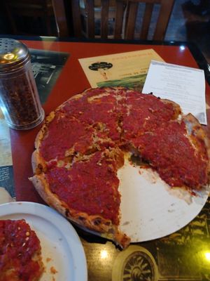 Traditional deep dish pizza at Kitchen 17 in Chicago