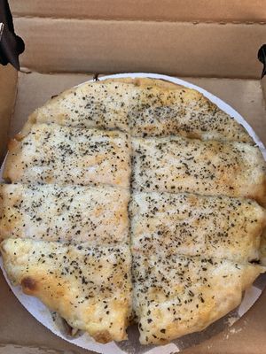 Cheesy garlic bread (comes with a side of marinara)  at Kitchen 17 in Chicago