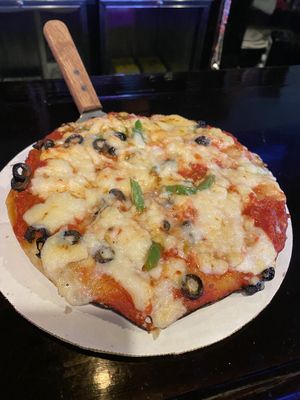 10” pizza with olives and green peppers  at Kitchen 17 in Chicago