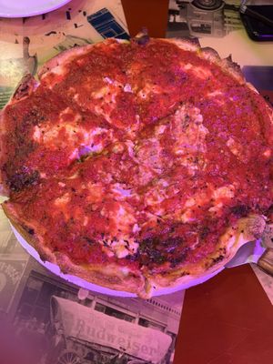 Sausage and onion deep dish  at Kitchen 17 in Chicago