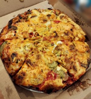 Cheeseburger Pizza at Kitchen 17 in Chicago