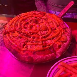 cheeseburger pizza at Kitchen 17 in Chicago