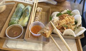 Mushroom lemongrass summer roll, corn spring roll, lotus root salad  at Sen Saigon in New York City