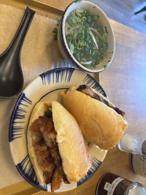 Pork belly banh mi and pho broth side   at Sen Saigon in New York City