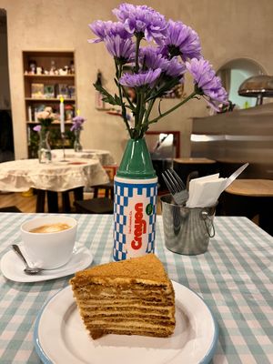 Honey cake and cappuccino. at Plantastic Kitchen in Tbilisi