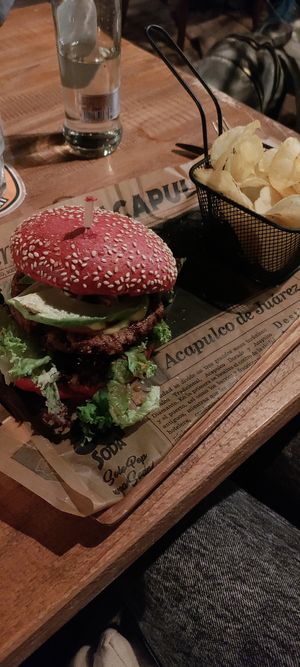 The avocado burger with chips at avant garden in Maastricht