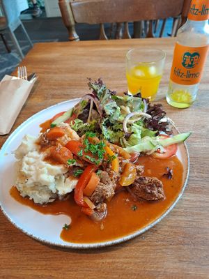 Goulash with mash and salad. at avant garden in Maastricht