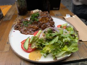 Sour stew with mushrooms and mash at avant garden in Maastricht