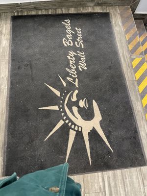 Floor mat  at Liberty Bagels - Wall Street in New York City