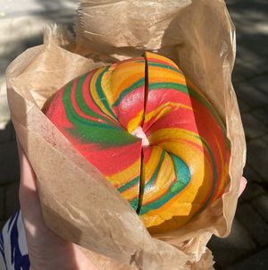 Rainbow bagel with strawberry tofu cream cheese - filling was amazing, bagel not so much!  at Liberty Bagels - Wall Street in New York City