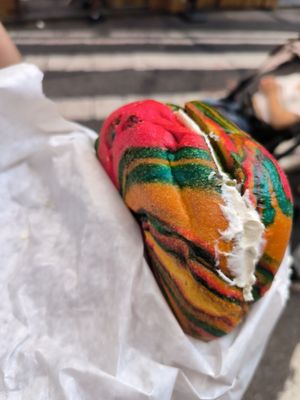 Rainbow bagel with tofu spinach and artichoke at Liberty Bagels - Wall Street in New York City
