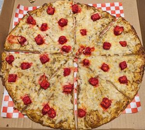 curry sauce, vegan cheese, and vegan tandoori chicken at Fusion Curry Pizza in Portland