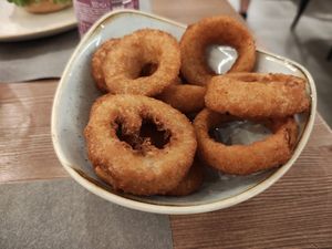 Anelli di cipolla (antipasto) at Pota Mountain Burger in Ponte Di Legno