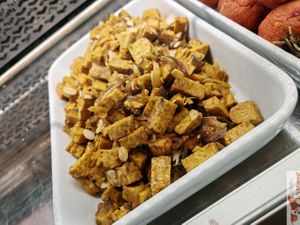 Tempeh with curry at Ko.bo Vegan in Milan