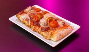 Pizza cherry and onion  at New Freedom Cakes Cafe in Madrid