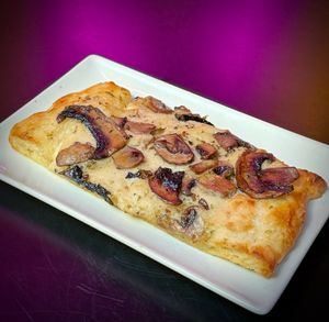 Pizza mushrooms and truffle  at New Freedom Cakes Cafe in Madrid