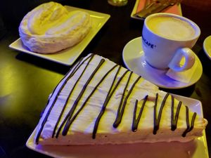 Baked goods and a decaf at New Freedom Cakes Cafe in Madrid