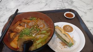 Spicy kway tiao soup and Vietnamese roll at VeganPho - Lucky Plaza in Central Singapore