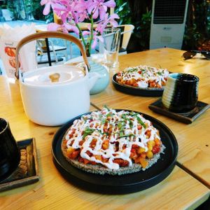 Raw Vegan Hawaiian Pizza with macadamia cheese.  at Rasayana Raw Food Cafe in Bangkok