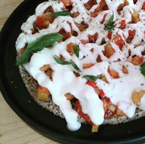 Raw pizza at Rasayana Raw Food Cafe in Bangkok