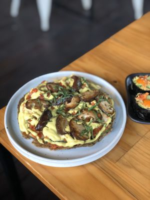 Marinara pizza. sunflower seeds crust, cashew nut cheese. at Rasayana Raw Food Cafe in Bangkok