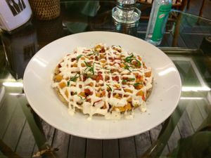 raw pizza at Rasayana Raw Food Cafe in Bangkok