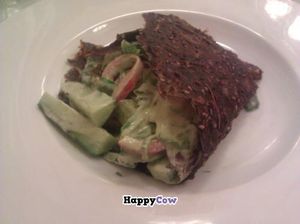 Sundried tomato roll filled with veggie cream at Secret of Raw in Prague