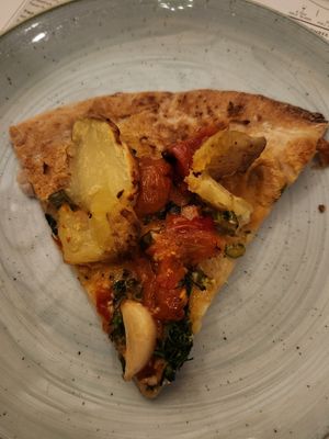 Vegan broccolini and potato pizza (cauliflower crust, cashew cheese, toppings - roasted broccolini, crushed potato, calabrian chilies, tomato, and rosemary) at Sixty Vines in Plano