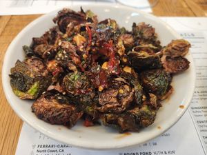 Brussel sprouts (crisp fried, kung pao vinaigrette, scallions, cashews) at Sixty Vines in Plano