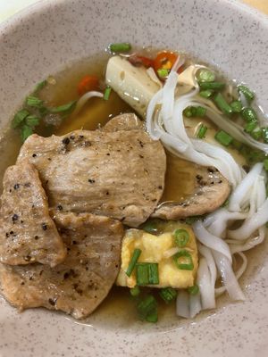 Mock meat tofu noodles chilli and herbs create your own  at Homie Vegan in Hanoi