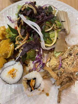 Salad with the best veg fish sauce, curry, mushrooms and sushi   at Homie Vegan in Hanoi