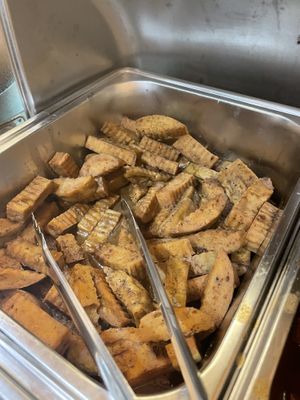 Meat with gravy   at Homie Vegan in Hanoi