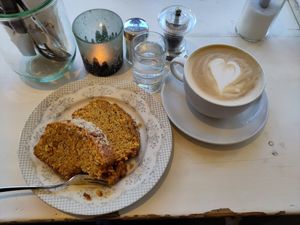 Hafer-Cappuccino, Möhren-Nuss-Kuchen (vegan) at Cafe Glückskind in Kiefersfelden