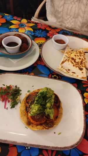 Vegetarian quesadillas and vegan croquettas and other small dish at Mariachi Restaurant in Edinburgh