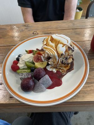 pancakes with choc chips, caramel and cream toppings   at Dragonfruit Café in Whangarei