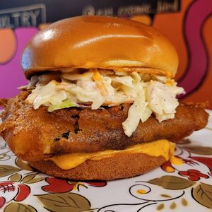 Phish sandwich,  curry beer batter, chili crisp mayo, slaw on a toasted bun at Cosmic Bird in Louisville