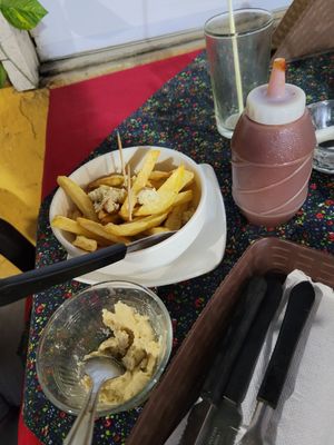 fries with sauce at Govindas Vegetarian Food & Yoga in Leticia