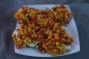 Patacones with cheese, corn and tomatoes at Govindas Vegetarian Food & Yoga in Leticia