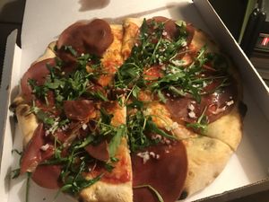 pizza mopur: mopur (vegan meat), vegan mozzarella, vegan soft cheese, rucola, tomato sauce   at Pizzeria Vesuvio in Moncalieri