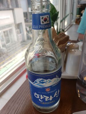 Promised myself I'd try Soju. It's a bit like drinking straight vodka. at Mt Everest Indian Halal Restaurant - 인도 음식 in Jeju