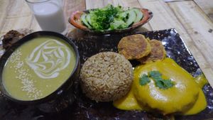 Crema de arveja, leche de ajonjoli, arroz con coco, filete de la casa at Salud & Sabor in Bolivar