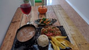 Mazamorra plátano maduro y leche de coco. Bistec filete apanado at Salud & Sabor in Bolivar