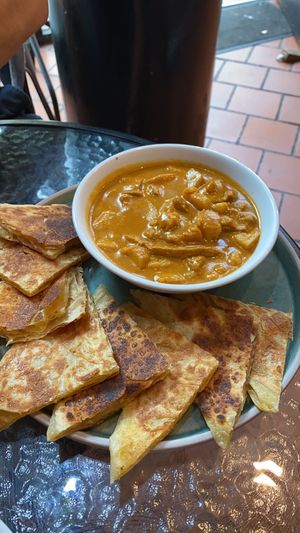 Roti canai with potato and soy chunks  at September Vegan Food in Wellington