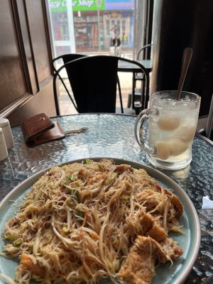 Singapore style fried vermicelli and lychee drink  at September Vegan Food in Wellington