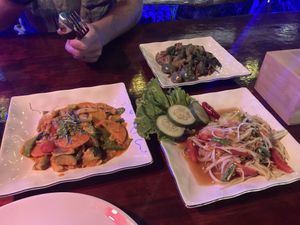 Penang curry, eggplant and tofu curry, and papaya salad   at Extra Time Sports Bar & Restaurant  in Koh Yao Noi