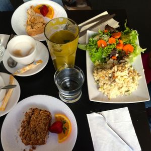 Lunch, green smoothie, apple crumble, slice, and coffee. Sorry, was so yummy, I forgot to take picture before we started eating...  at Katzentempel - München in Munich