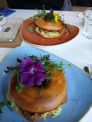 Avocado and sausage bagel  at Joys Coffee House in Otley